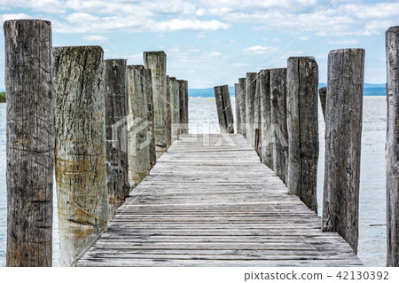Wooden pier in Podersdorf am See, Austria 42130392