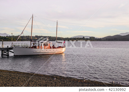 Te Anau lake and boat 42130992