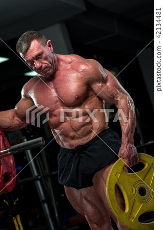 Mature bodybuilder with perfect muscular body Mature bodybuilder with perfect muscular body 42134481