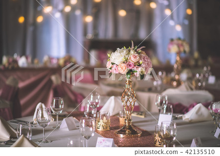 wedding table with exclusive floral arrangement  42135510