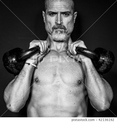 Portrait of a Man Raising Weights. Portrait of a Man Raising Weights. 42136192