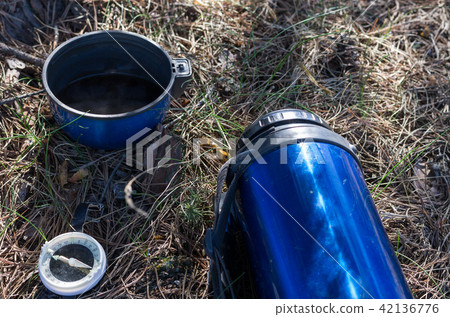 Morning coffee in the forest. 42136776