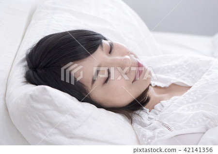 Girl enjoying a leisurely relaxing time on holiday Girl enjoying a leisurely relaxing time on holiday 42141356