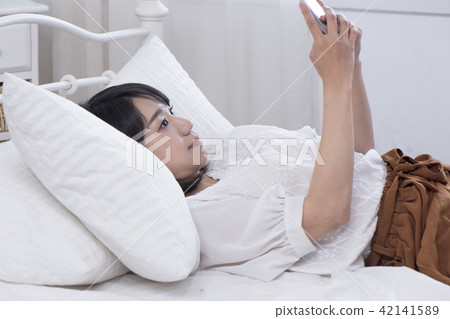 Girl enjoying a leisurely relaxing time on holiday Girl enjoying a leisurely relaxing time on holiday 42141589