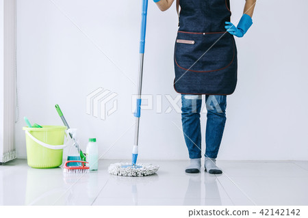 Housekeeping and cleaning concept, Happy young woman in blue rub 42142142
