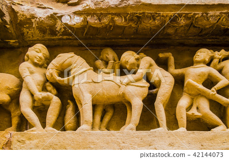Erotic scenes in Kahjuraho temple, India Erotic scenes in Kahjuraho temple, India 42144073