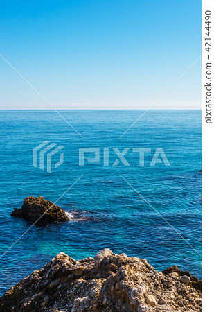 Amazing sea with blue summer wave and rocks Amazing sea with blue summer wave and rocks 42144490