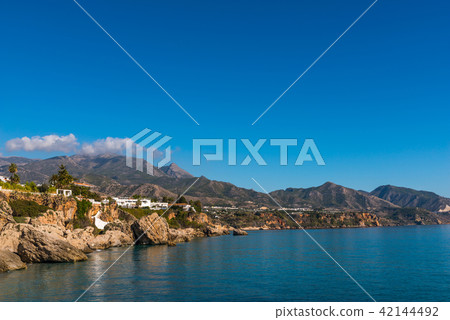 Amazing sea with blue summer wave and rocks Amazing sea with blue summer wave and rocks 42144492