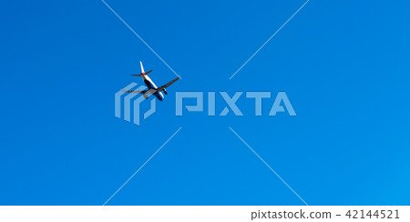 Passenger plane flying in the blue sky Passenger plane flying in the blue sky 42144521