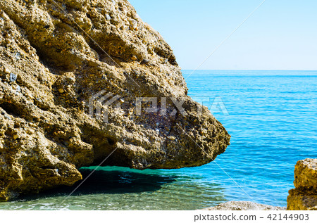 Amazing sea with blue summer wave and rocks Amazing sea with blue summer wave and rocks 42144903