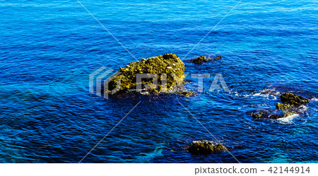 Amazing sea with blue summer wave and rocks 42144914