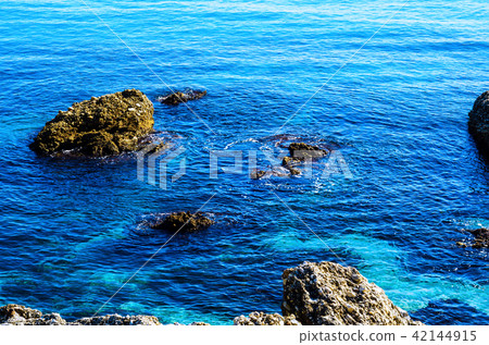 Amazing sea with blue summer wave and rocks 42144915