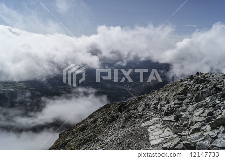 on mountain peak on mountain peak 42147733