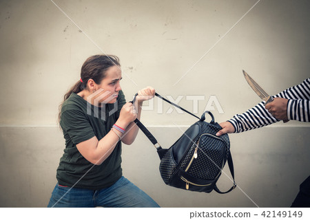 Bandit man snatching women's backpack  42149149