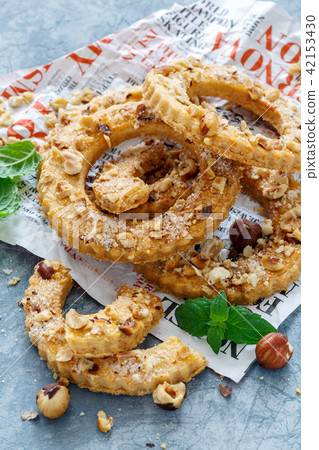 Shortbread in the shape of a ring with hazelnut. Shortbread in the shape of a ring with hazelnut. 42153430
