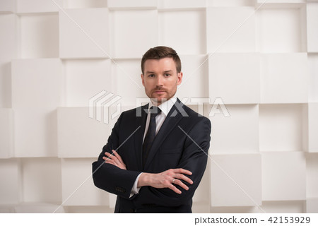 Portrait of man in black suit Portrait of man in black suit 42153929