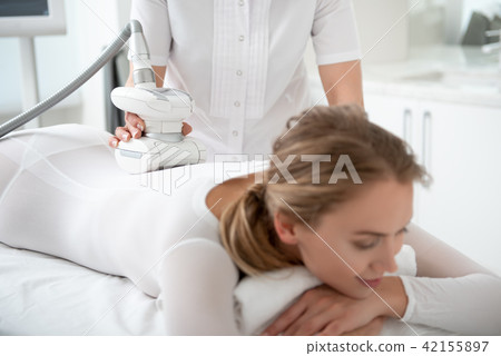 Glad girl getting anti-fat massage 42155897