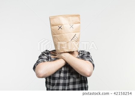 Portrait of men in dead paper bag mask Portrait of men in dead paper bag mask 42158254