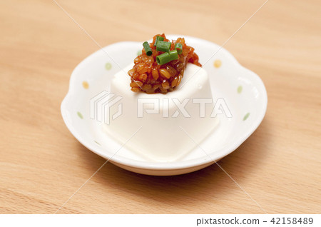 Pouring cold moromi miso 42158489