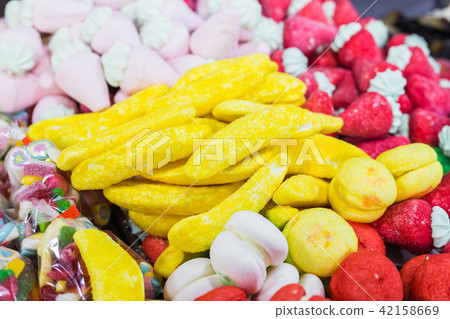 Assortment of fine chewy candy the most delicious of them banana Assortment of fine chewy candy the most delicious of them banana 42158669