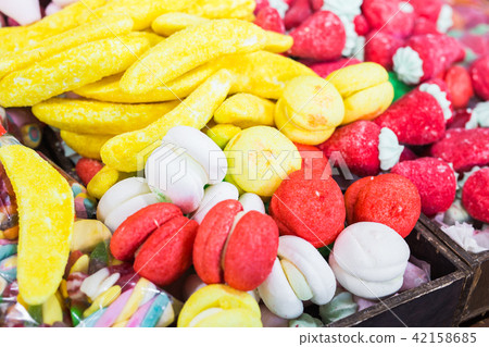 Assortment of fine chewy candy the most delicious of them banana Assortment of fine chewy candy the most delicious of them banana 42158685