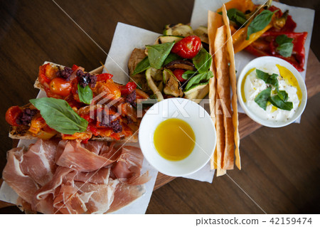 Assortment of delicious Italian antipasto. Assortment of delicious Italian antipasto. 42159474
