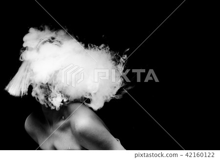 creative of art woman portrait and smoke in face. black in white portrait and smoke on black creative of art woman portrait and smoke in face. black in white portrait and smoke on black 42160122