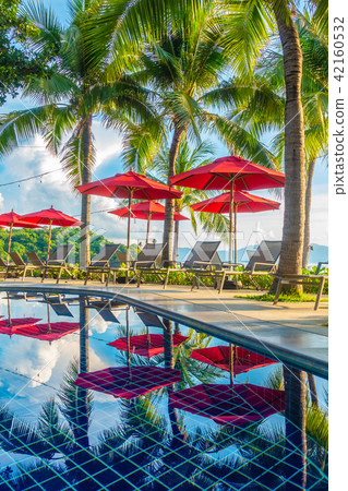 Beautiful luxury outdoor swimming pool in hotel and resort 42160532