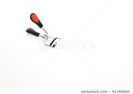 Eyelash curler on white background Eyelash curler on white background 42166680