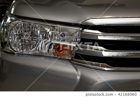 Closeup headlights of car. Closeup headlights of car. 42168060