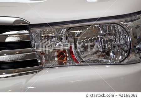 Closeup headlights of car. 42168062