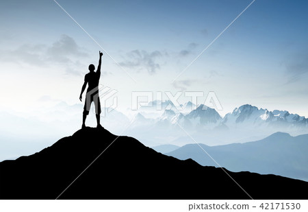 Winner silhouette on the mountain top. Winner silhouette on the mountain top. 42171530