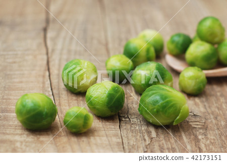 Healthy Food Brussel Sprout Cabbage isolated Rustic Wooden Background 42173151