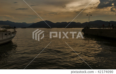 sunset at the sea. golden hour. sunset at the sea. golden hour. 42174090