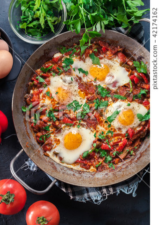 Shakshuka in a frying pan Shakshuka in a frying pan 42174162