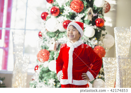 Children wearing clothes in Santa Claus Christmas 42174853