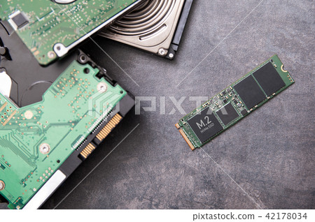 Modern M.2 SSD drive and old hard disk drives Modern M.2 SSD drive and old hard disk drives 42178034