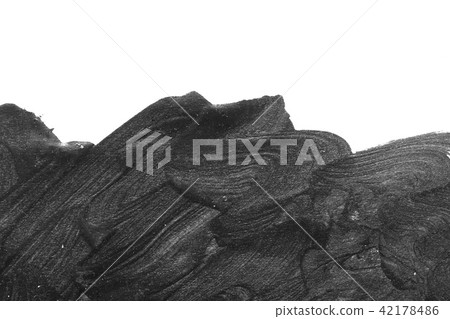 Black brush strokes on white paper isolated. 42178486