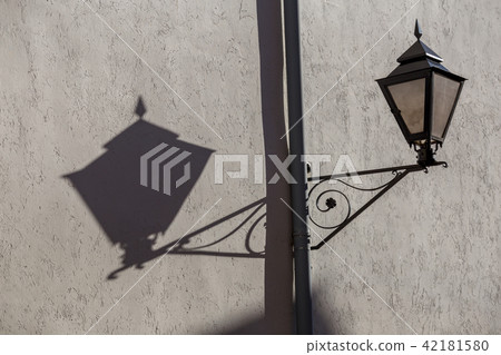 Interesting picture from a lamp and the shadows Interesting picture from a lamp and the shadows 42181580
