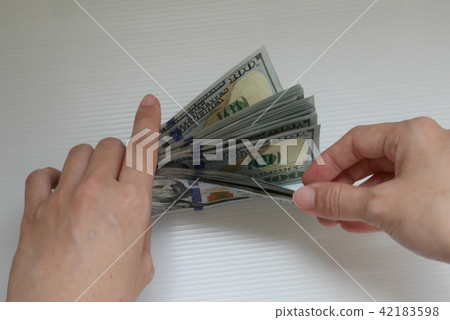 Counting USD currecy banknote money exchange 42183598