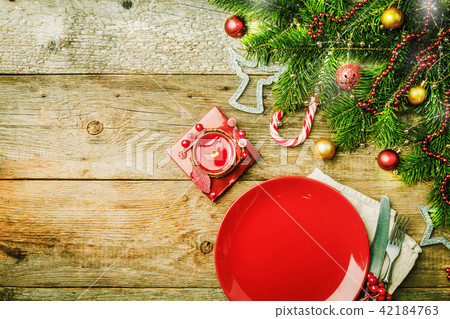 Christmas table place setting Christmas table place setting 42184763