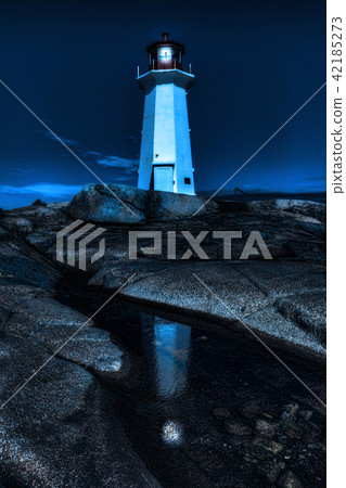 Vertical of Peggy's Cove Lighthouse at night 42185273