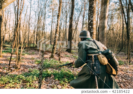 Re-enactor Dressed As German Infantry Wehrmacht Soldier Of The World War II Re-enactor Dressed As German Infantry Wehrmacht Soldier Of The World War II 42185422