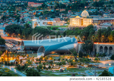 Evening Illuminated View Of The Concert Hall, Rike Park And Presidential Palace At Cityscape 42185528