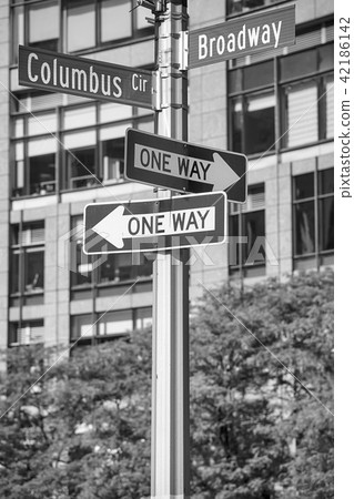 Broadway and Columbus Circle street name signs. 42186142