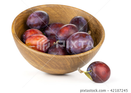 Fresh Raw vibrant plums isolated on white Fresh Raw vibrant plums isolated on white 42187245