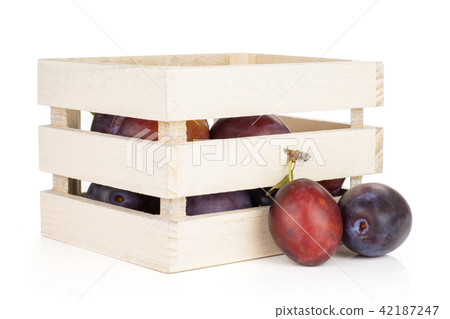 Fresh Raw vibrant plums isolated on white Fresh Raw vibrant plums isolated on white 42187247