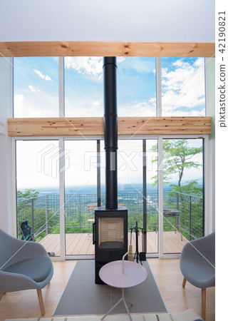 A villa with a fireplace 42190821