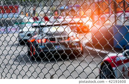 Motor sport car racing on asphalt road.  42191608