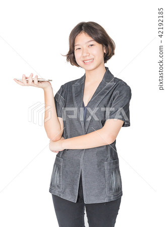 Women stand with using mobile phone Women stand with using mobile phone 42192185